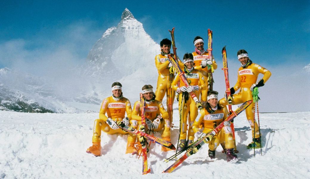 Drei Schweizer Monumente: Käse, Matterhorn und das Skiteam. 